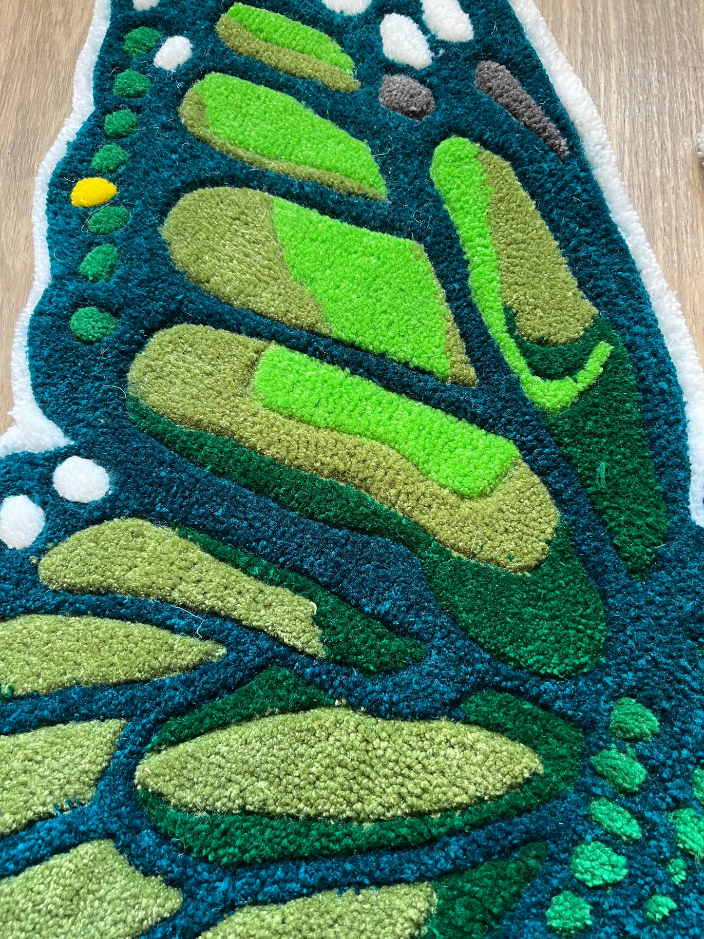 Tufted butterfly rug